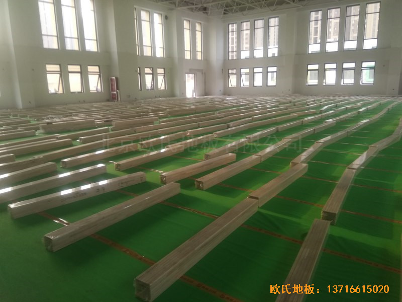 山東濟(jì)南唐冶城籃球館運(yùn)動(dòng)木地板施工案例3